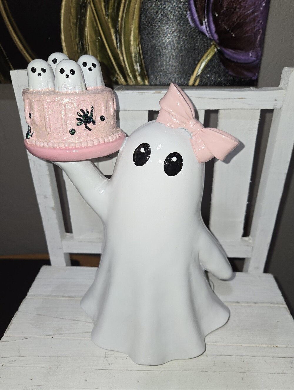 Halloween Ghost With Pink Bow Holding A Pink Cake